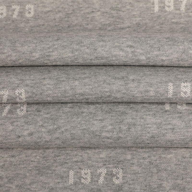 32s Celese + 100D/36F recyklovaný polyester + 10s Celese Jacquard Fleece Fabric